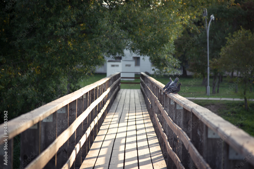 Obraz premium Wooden bridge over the river. Suzdal