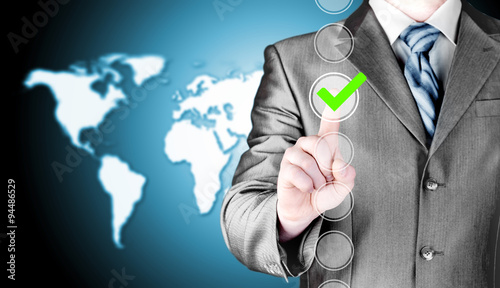 business man touching, pressing modern button with green ticking Check Box