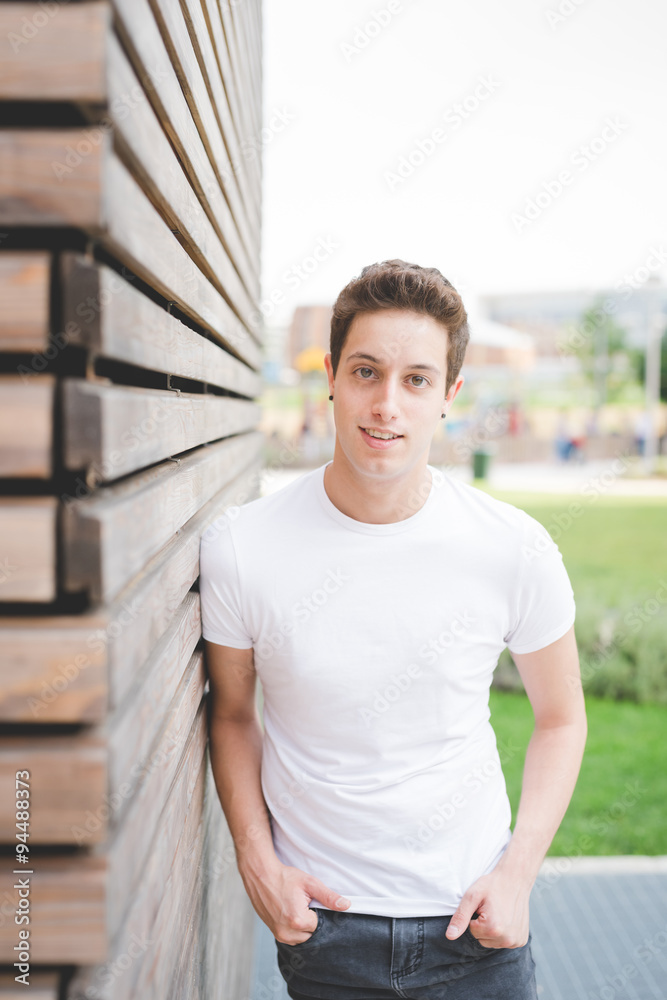 Obraz premium Young handsome caucasian brown hair man ballet dancer posing and dancing in the street of the city - movement, dancing, elegance concept
