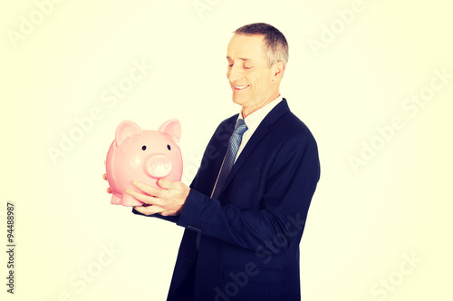 Businessman with piggybank