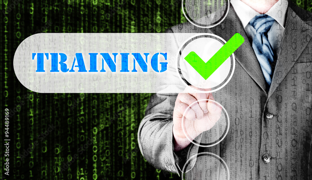 Businessman pressing touch screen interface training checkbox