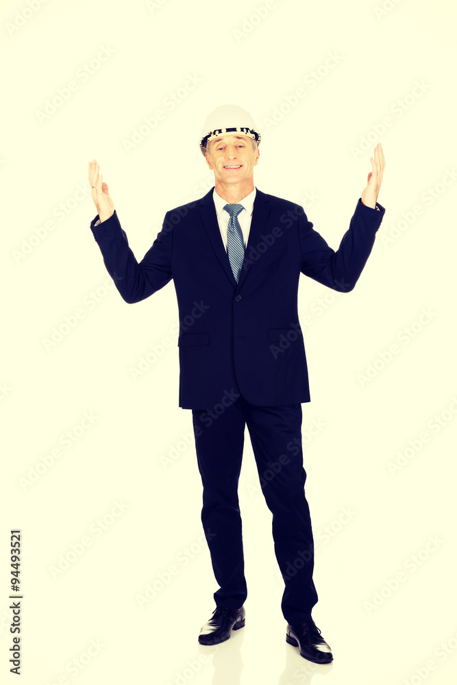 Smiling businessman with open arms up Smiling businessman with open arms up