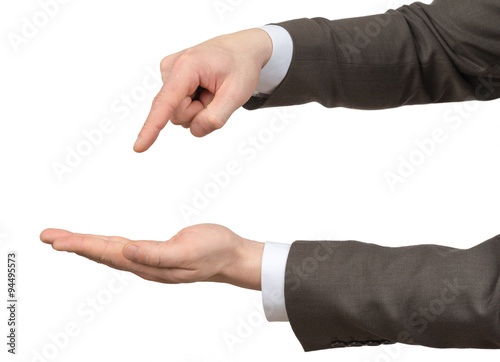 Businessmans hands pointing at empty space