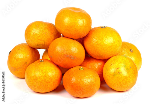 fresh tangerines on a white background.