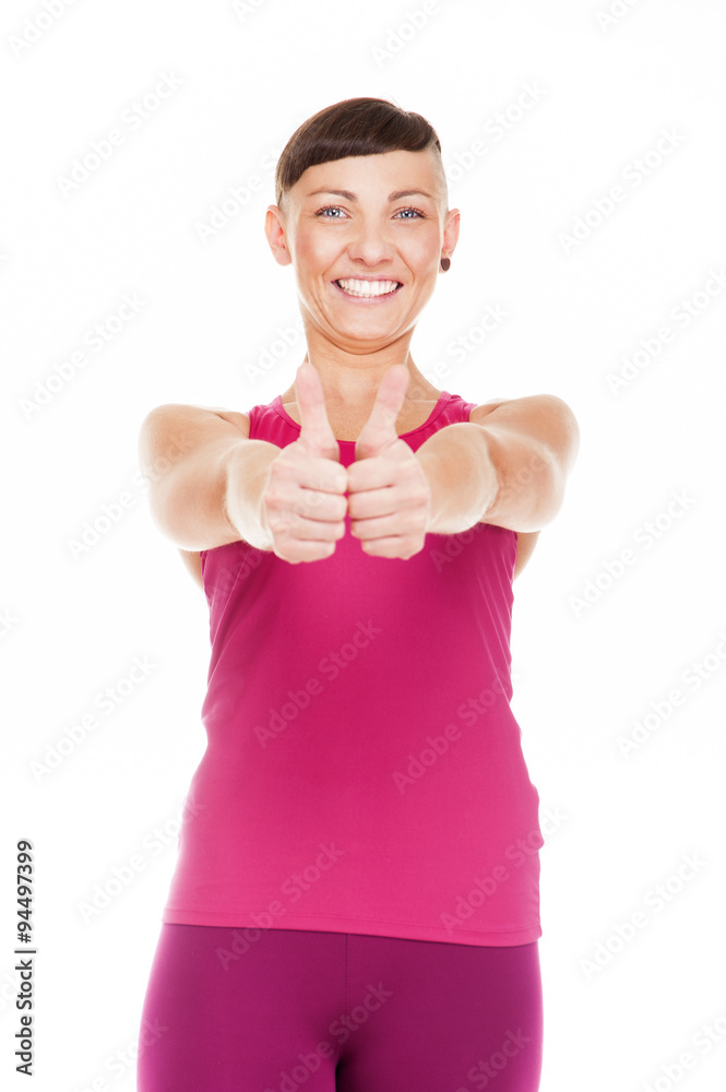 Portriat of fitness woman with thumbs up. Isolated over white ba Portriat of fitness woman with thumbs up. Isolated over white ba