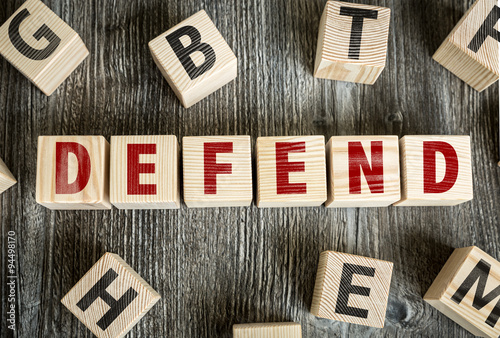 Wooden Blocks with the text: Defend
