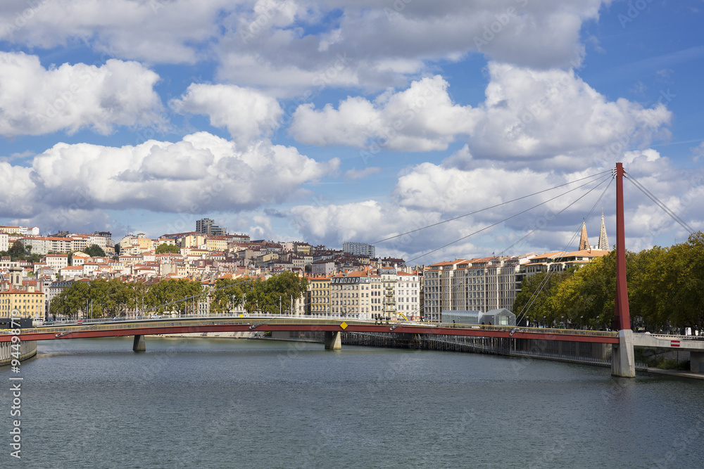 View of Lyon with red footbridge