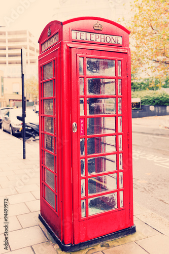 Famous classic English red telephone box - symbol of London