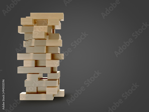 Blocks wood game  jenga  on black background.