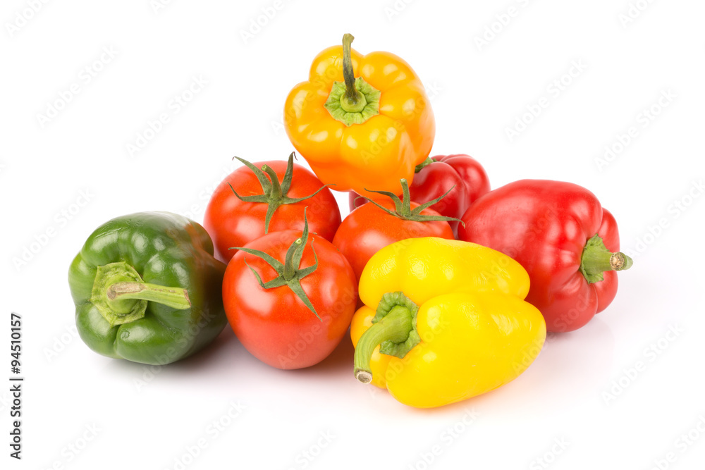 Group of sweet vegetables: yellow, orange, green, red paprika and freshness tomatoes on white isolated background. Group of sweet vegetables: yellow, orange, green, red paprika and freshness tomatoes on white isolated background.