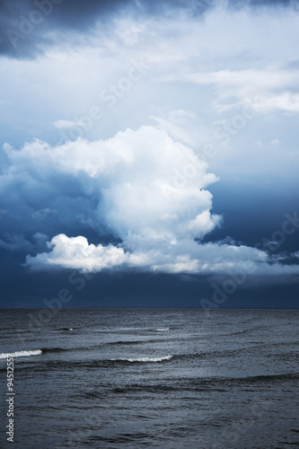 White cloud and dark sea.