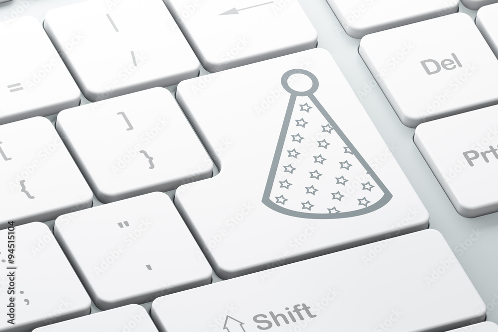 Holiday concept: Party Hat on computer keyboard background Holiday concept: Party Hat on computer keyboard background