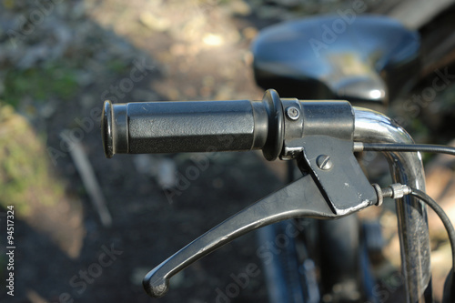Fototapeta Naklejka Na Ścianę i Meble -  Italian moped plastic retro handle, close-up