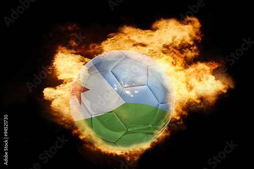 football ball with the flag of djibouti on fire