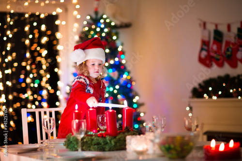 Child at family Christmas dinner at home