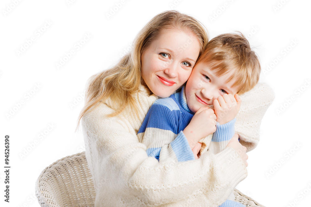 Young beautiful woman hugging with her son Young beautiful woman hugging with her son
