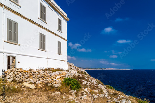 The lighthouse of Cape of Otranto in Italy photo