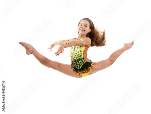 Young girl gymnast jumping 