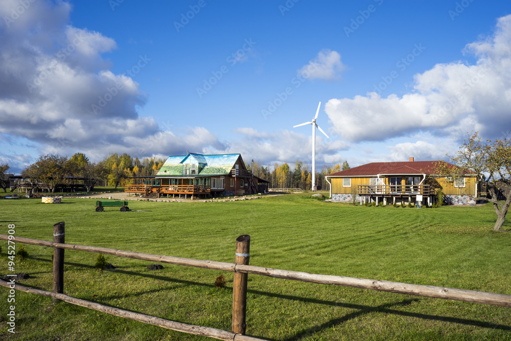 Electric power windmill in the village