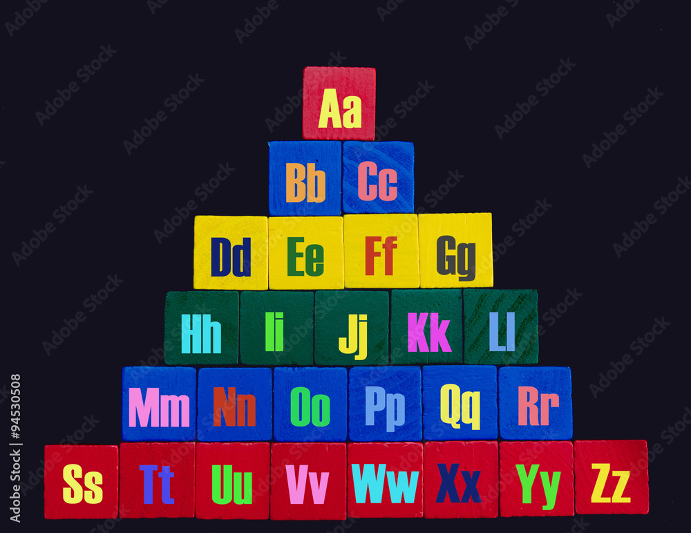 Colorful Alphabet as a pyramid made of wood blocks Colorful Alphabet as a pyramid made of wood blocks