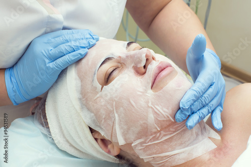woman passes a procedure Carboxytherapy in the beauty salon