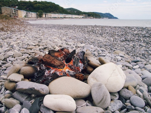 Camp fire on the seashore