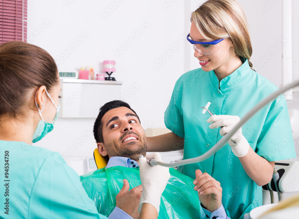 Fototapeta premium Dentist and scared patient .