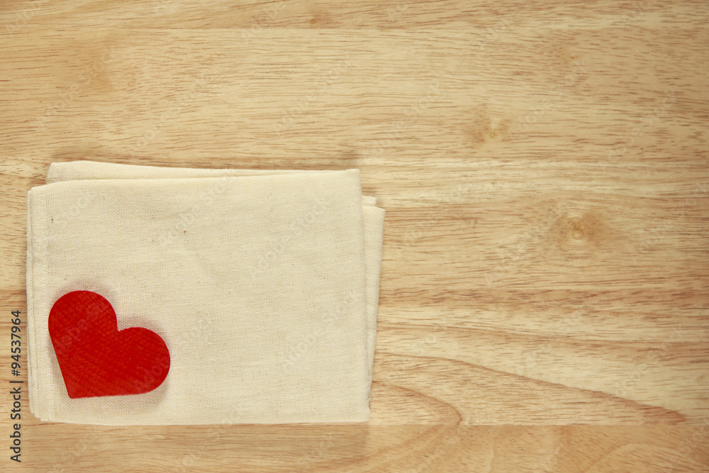 Stock Photo:.Red wooden heart on a wooden background with boke b Stock Photo:.Red wooden heart on a wooden background with boke b