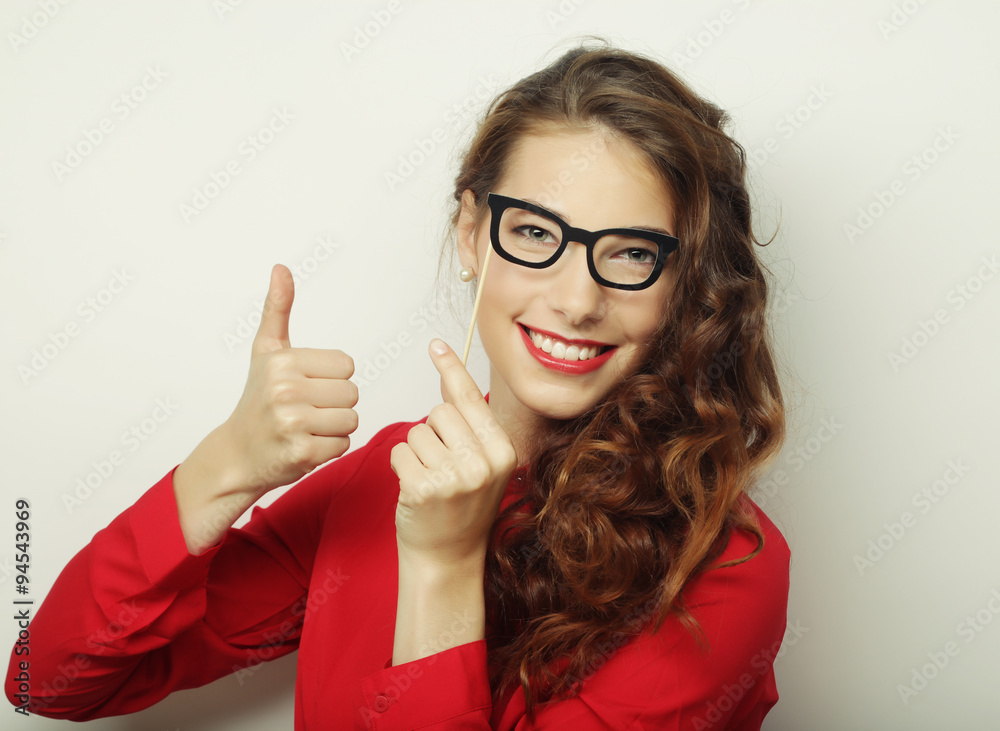 Party image. Playful young women holding a party glasses. Party image. Playful young women holding a party glasses.