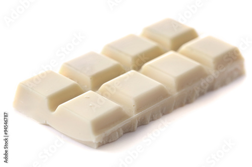 White chocolate pieces isolated on white background
