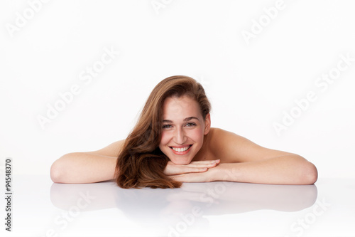 attractive young woman smiling for pampering massage