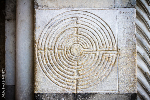 Ancient Labyrinth. Curious stone placed on San Martino Cathedral in Lucca, Tuscany, Italy.