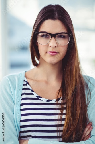 Young creative worker looking at camera