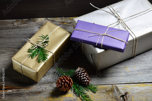 Stylish & Vintage christmas gifts box presents on the old wooden table