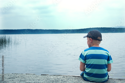 sad child sitting alone