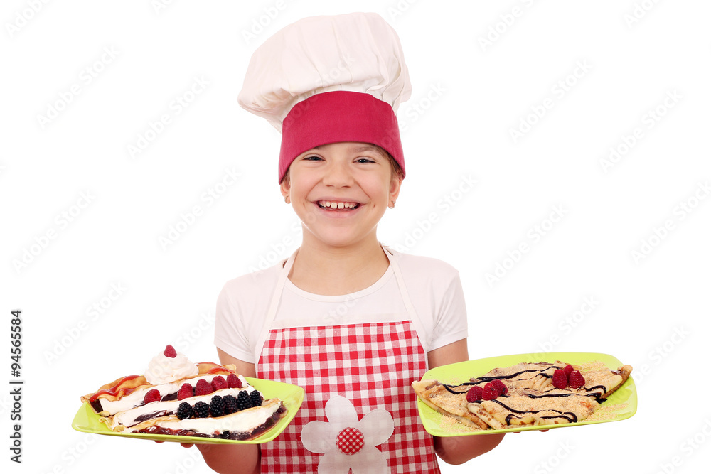 happy little girl cook with crepes on plate happy little girl cook with crepes on plate