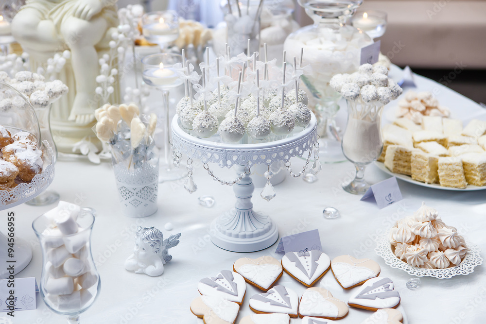 Dessert table with cake and candy on a wedding day