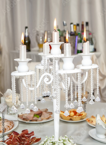 Wedding candlestick with flower decoration