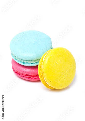 Colorful three macaroons isolated on white.