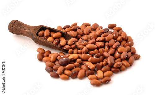 Red beans in a wooden scoop
