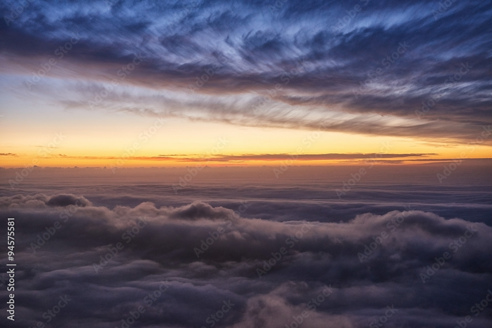View from a mountain top above the clouds View from a mountain top above the clouds