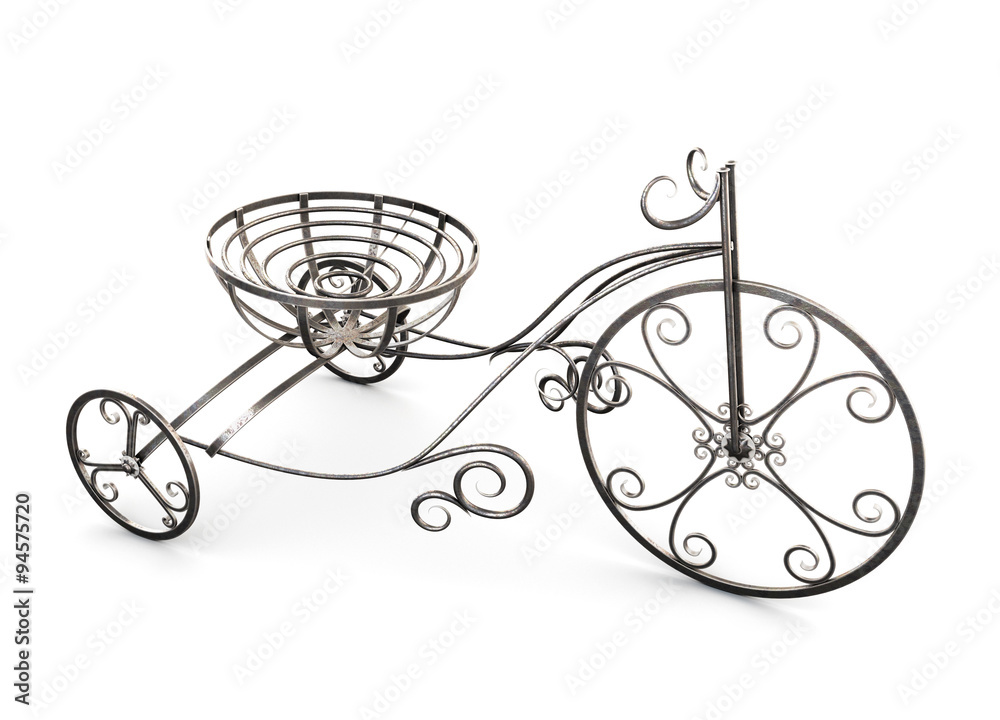Small metal decorative tricycle.