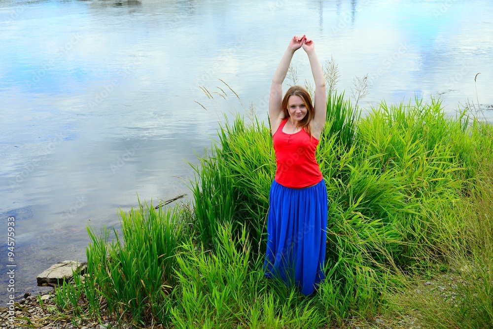 A girl on riverside of Neris river in Vilnius
