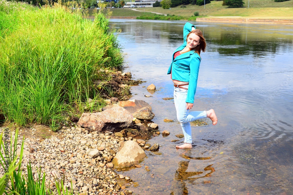 A girl on riverside of Neris river in Vilnius