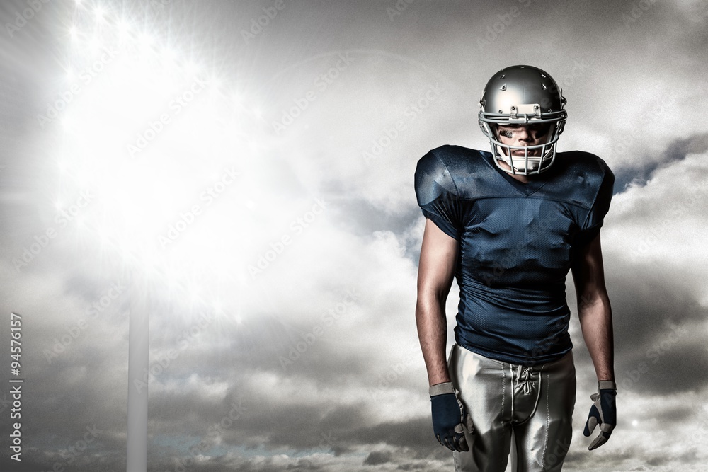 Composite image of american football player standing