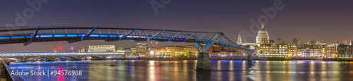 Panoramic shot of St Paul's Cathedral and the Millennium Bridge by night, London, UK #94576988