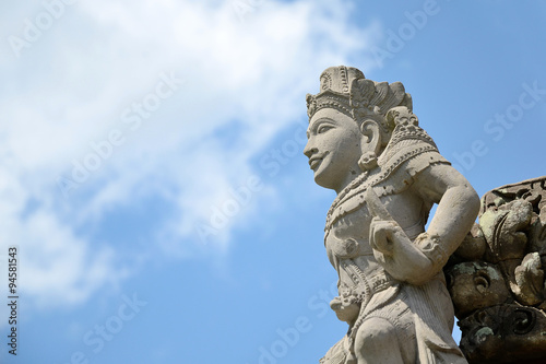 Bali style sculpture and blue sky in hindu temple at indonesia