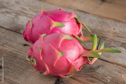 Dragon fruit on wooden table.