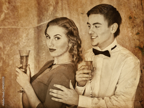 Couple with gift box.  Black and white retro. photo