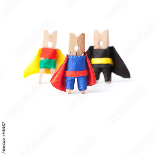 Success leadership conceptual image. Superheroes clothespins. White background © besjunior